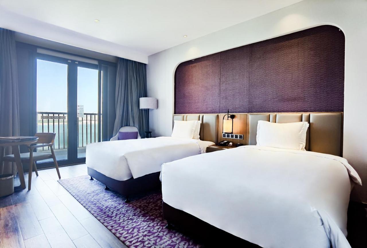 Hotel Crowne Plaza Qingdaoorientalmoviemetropolis By Ihg Exterior foto