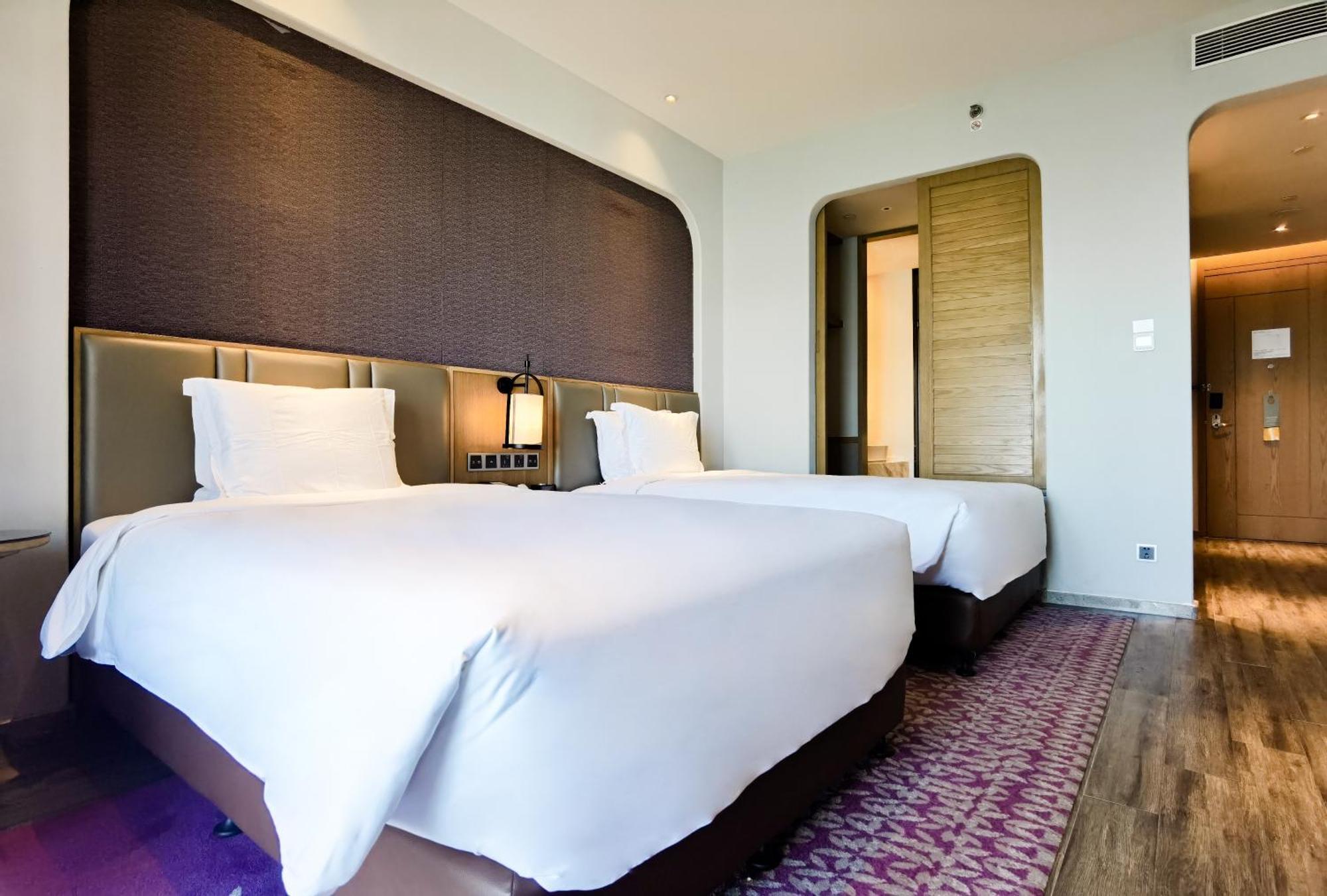Hotel Crowne Plaza Qingdaoorientalmoviemetropolis By Ihg Exterior foto